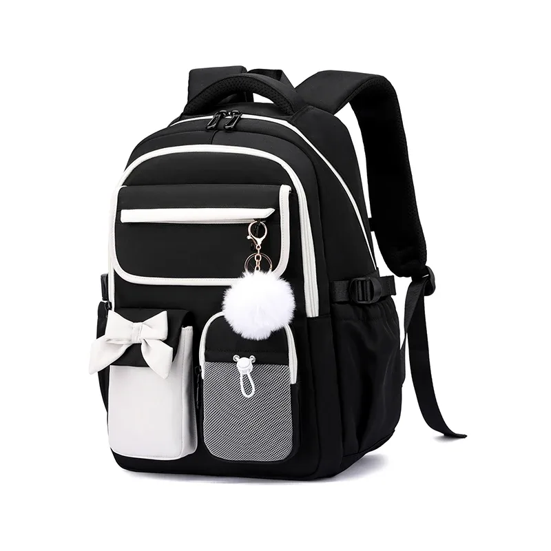 nouveau sac à dos scolaire en nylon grande capacité 2026 pour filles, sac à dos tendance avec nœud et couleurs bonbon, sac à livres pour adolescentes, sac à dos de voyage