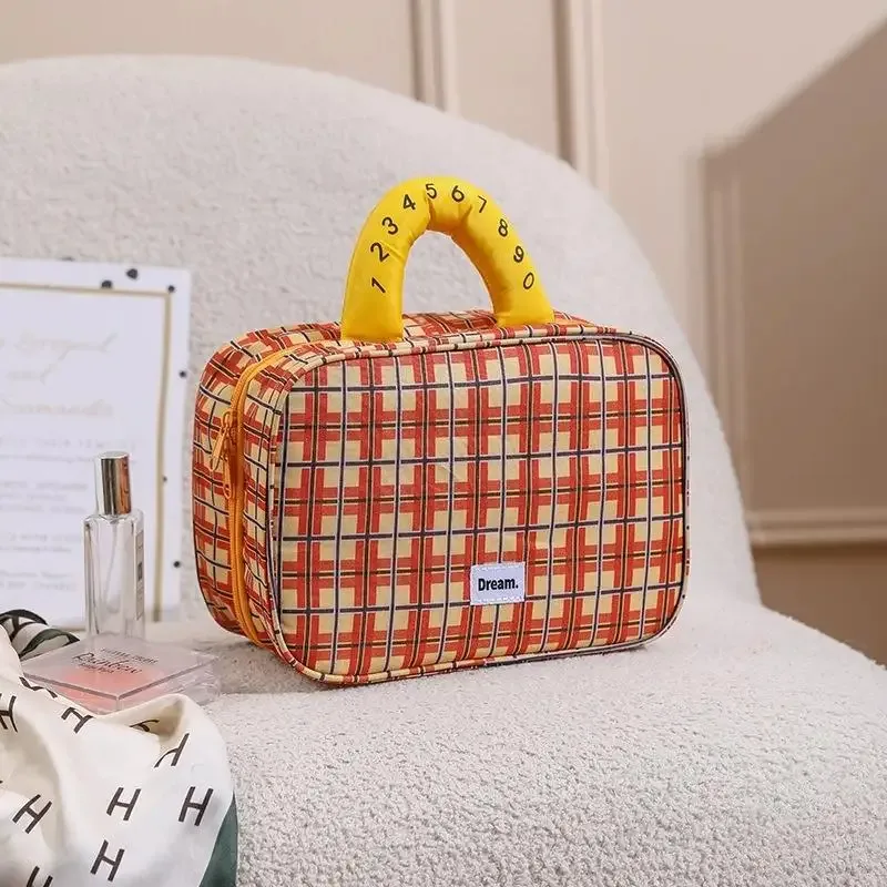 trousse de maquillage pliable de haute valeur esthétique avec crochet, sac de rangement de voyage de grande capacité, trousse de toilette portable pour voyage