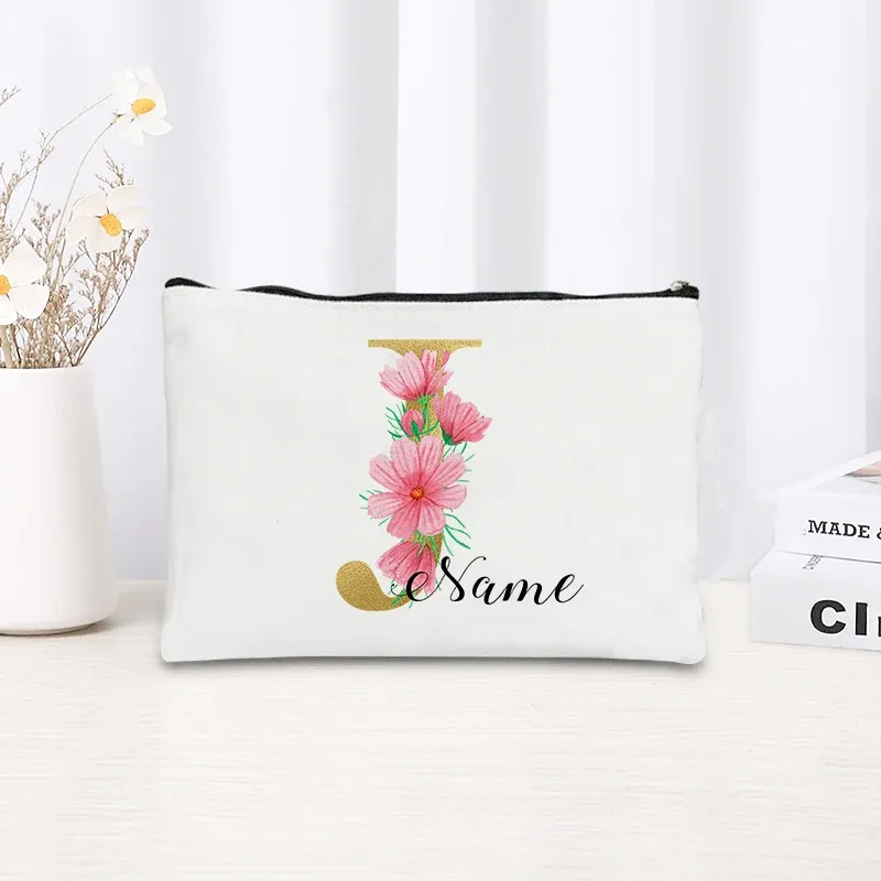 grande pochette zippée à motif floral rose et initiales dorées, organisateur d'essentiels de voyage en toile, trousse de maquillage pour enterrement de vie de jeune fille avec sac personnalisé avec nom.