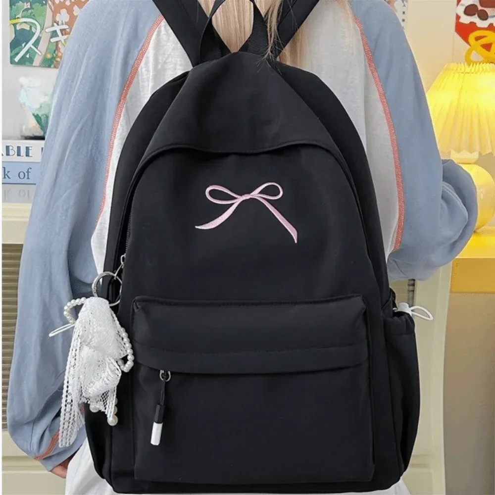 sac à dos portable avec nœud brodé pour filles, cartable en nylon de couleur unie pour étudiants, sac à dos de voyage léger de grande capacité