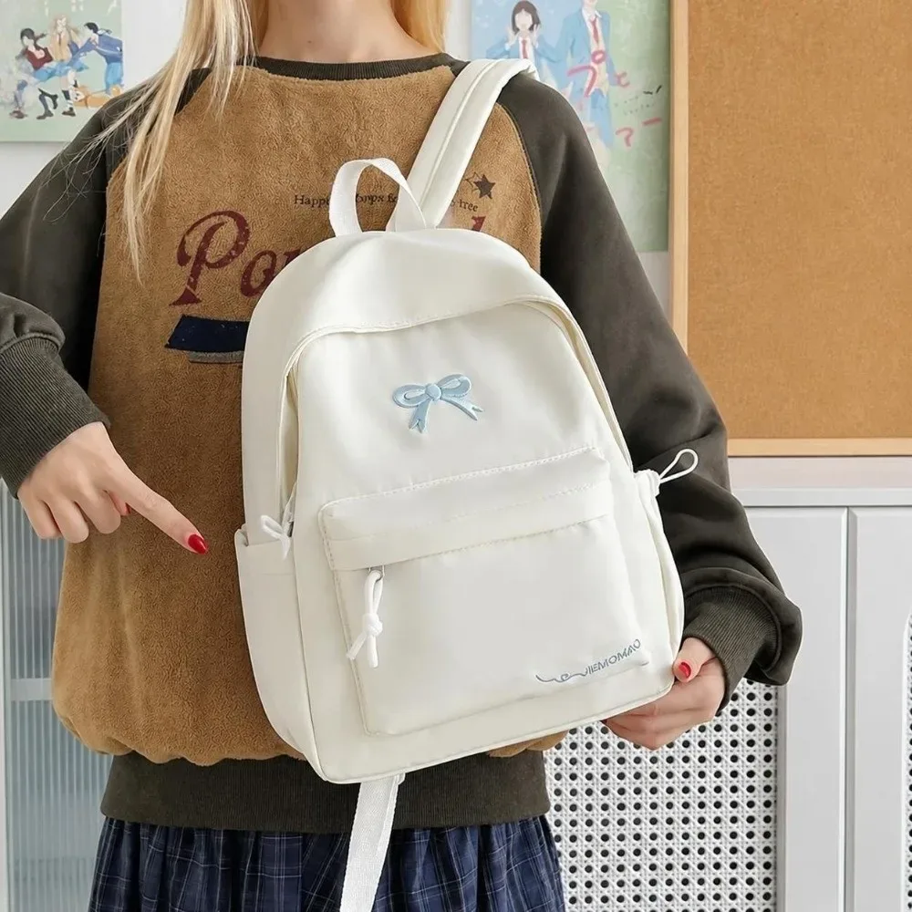 sac à dos décontracté tendance avec nœud brodé, grande capacité, polyvalent, sac d'école, sac à bandoulière simple pour étudiants