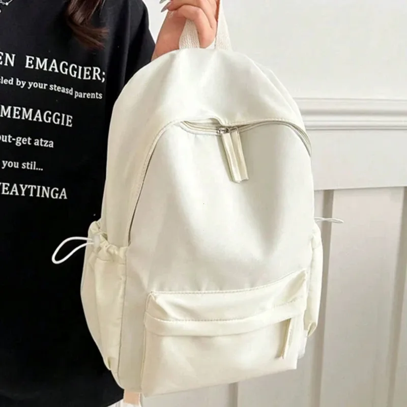 Sac à dos d'étudiant décontracté et tendance, couleur unie, pliable, multi-compartiments, grande capacité, adapté à la vie quotidienne sur le campus