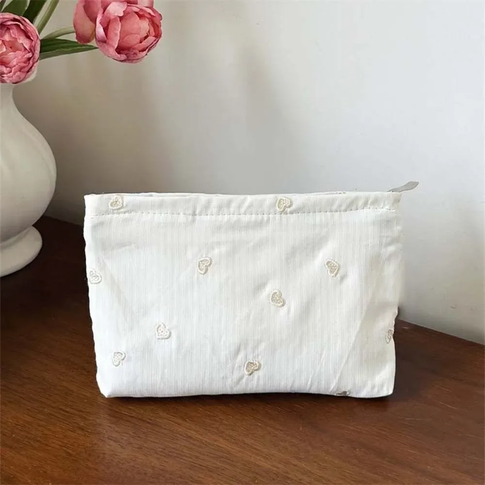 pochette à maquillage classique à rayures, motif brodé, fermeture éclair lisse, organiseur de cosmétiques, couleurs pastel, taille compacte, trousse de toilette