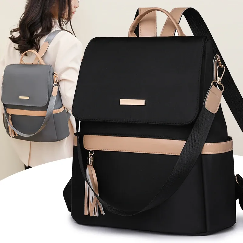 1 sac à dos classique antivol de taille moyenne avec des bretelles réglables noires minimalistes, parfait pour les activités de plein air, les voyages et les sorties.