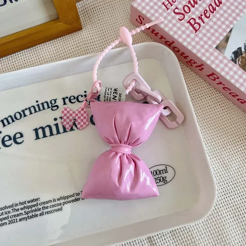 porte-clés en cuir et coton avec nœud doux pour fille, pendentif simple et mignon pour sac à dos, décoration de sacs