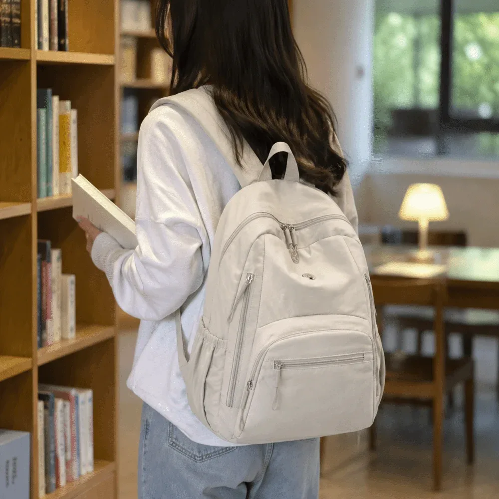sac à dos scolaire tendance en nylon grande capacité, léger, durable, imperméable, couleur unie, pour ordinateur portable, idéal pour les voyages et le quotidien