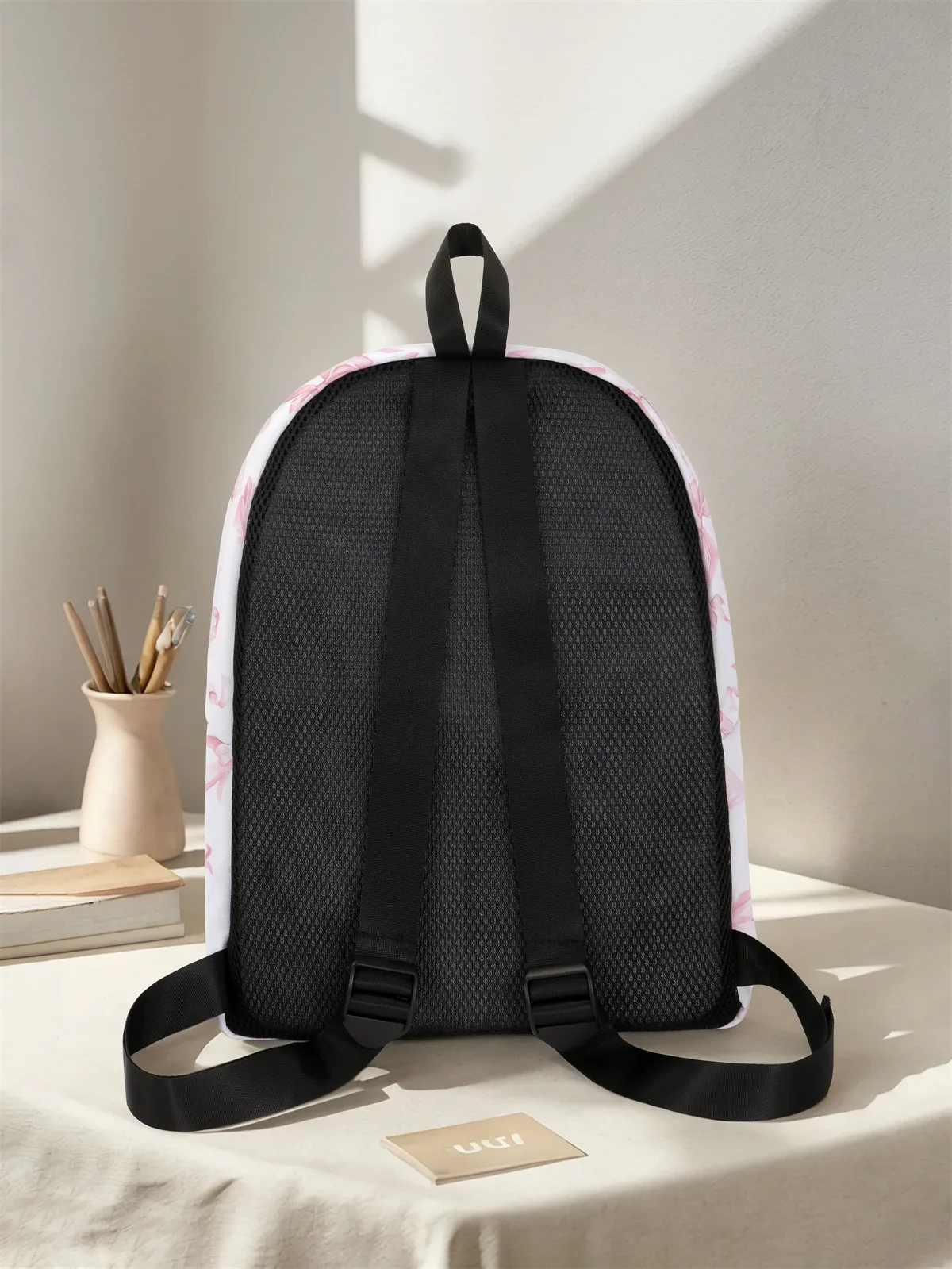 sac à dos à motif de nœud, nouveau modèle 2025, sac à dos de voyage décontracté, léger et simple.