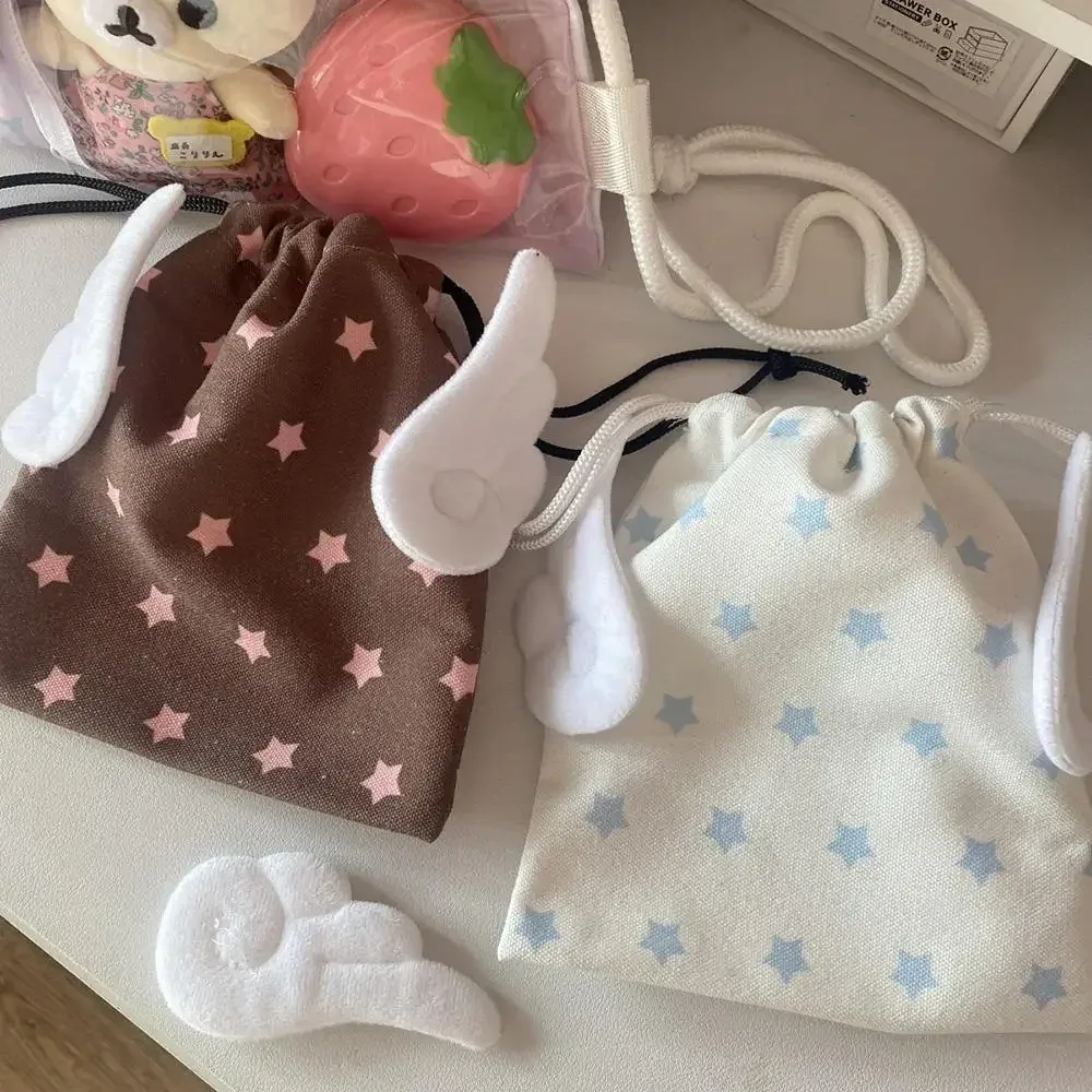 toile chaude ailes d'ange étoiles sac de maquillage ins cordon sac de rangement portable bundle poche anti-poussière sac de rangement organisateur sac