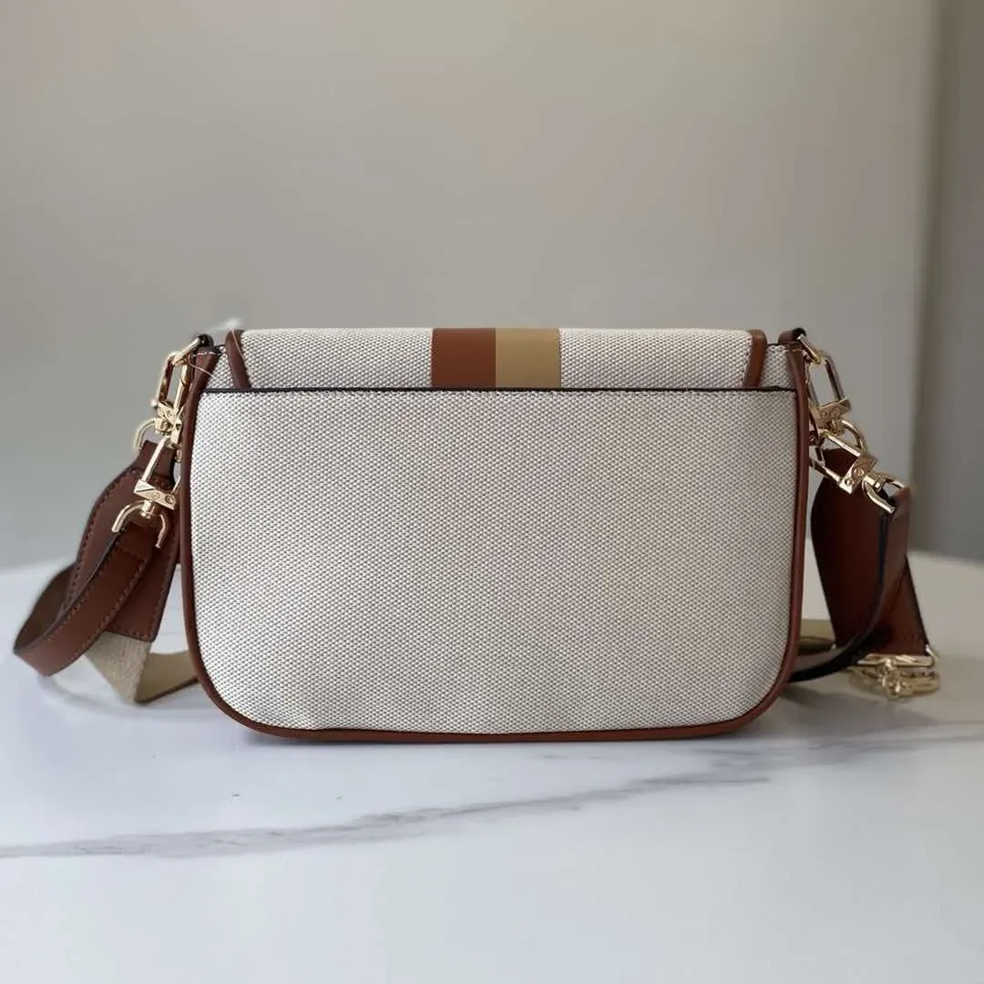 sac à cadenas mk flambant neuf de la marque michael kors, parfait pour les trajets quotidiens et les tenues de tous les jours