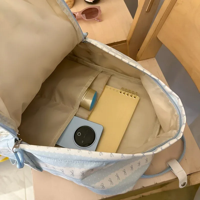 sac à dos en nylon à rayures et imprimé nœud pour femme, léger, mignon, pour étudiante, sac d'école, sac à dos de voyage quotidien pour ordinateur portable a4