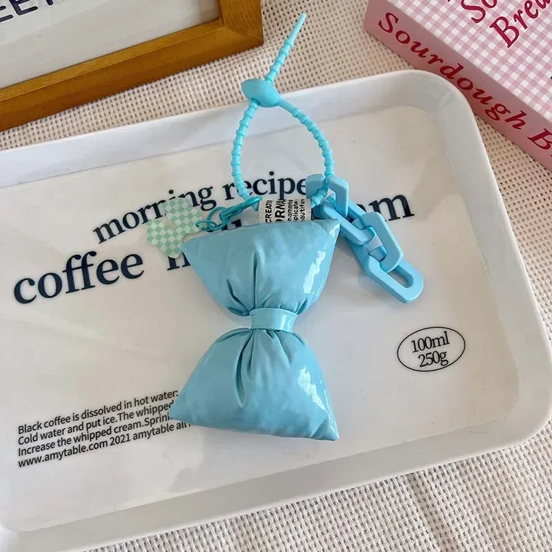 porte-clés en cuir et coton avec nœud doux pour fille, pendentif simple et mignon pour sac à dos, décoration de sacs