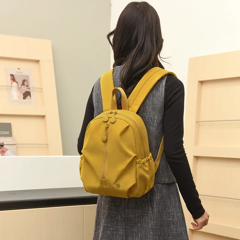 sac à dos antivol en nylon grande capacité pour femme avec compartiment multifonctionnel pour ordinateur portable, idéal pour les trajets quotidiens et les déplacements