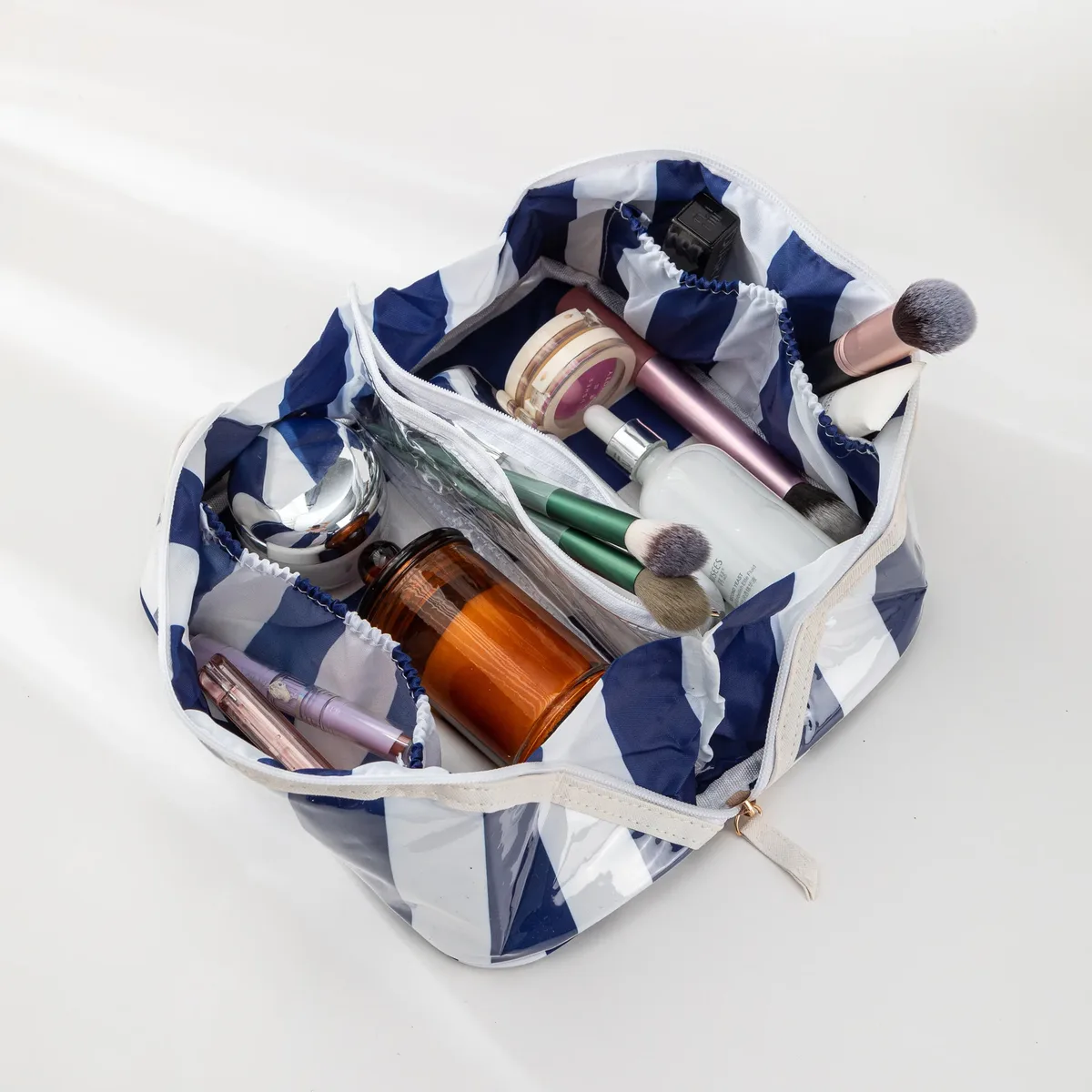 sac de voyage léger à grande capacité en pvc rayé pour cosmétiques, haute valeur esthétique, matériau intérieur oxford imperméable, triangulaire