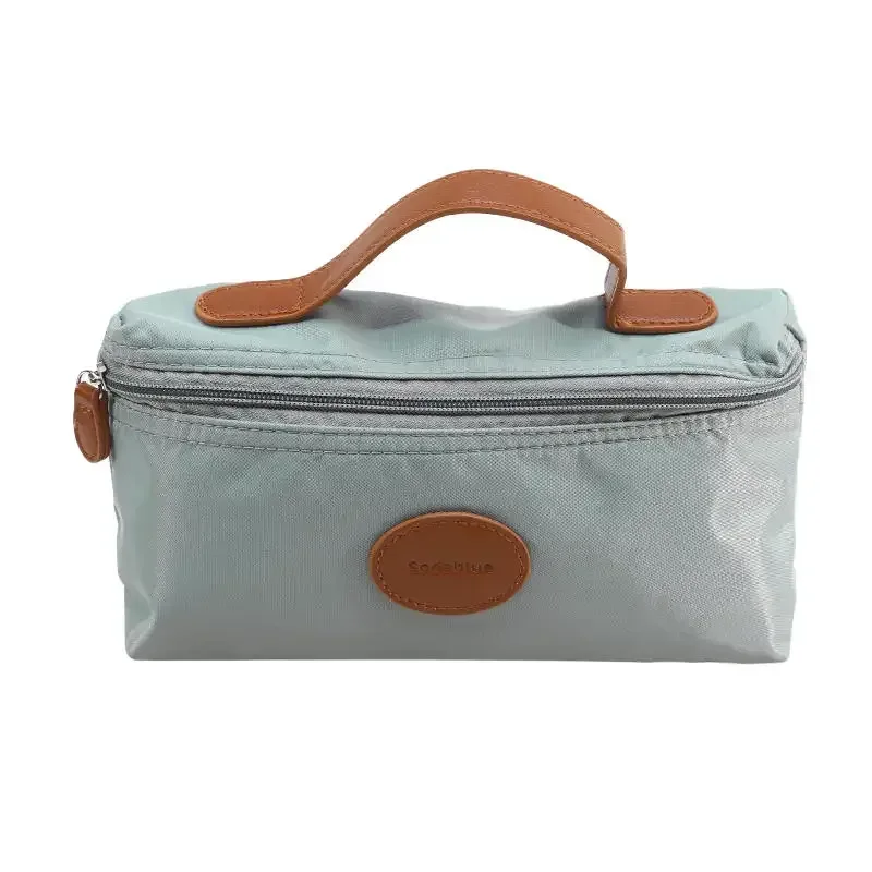 nouvelle trousse de maquillage portable 2026, sac cosmétique à main grande capacité en nylon, trousse de toilette de voyage pour femme, sac de rangement de voyage