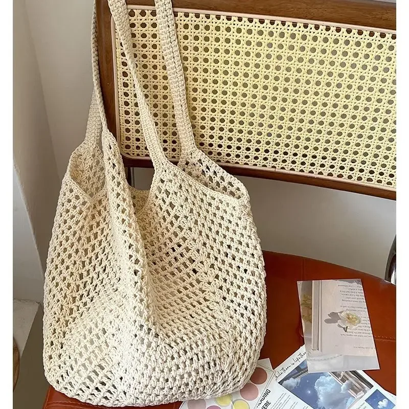 Nouveau sac à bandoulière décontracté en coton tricoté grande capacité, style paresseux, avec motif ajouré en paille, pour femme, idéal pour les vacances et la plage