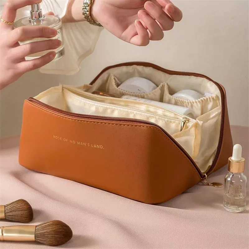 sac de maquillage pratique à la mode, sac de rangement de voyage en pu, trousse de toilette de grande capacité, sac de maquillage pour oreiller de beauté stimulant les mains
