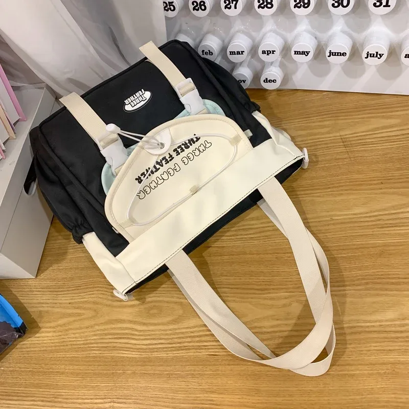 sac à dos avec pendentif de dessin animé ins de style coréen, sac à main pour femmes, sac d'école de grande capacité pour étudiants, sac de transport et de voyage