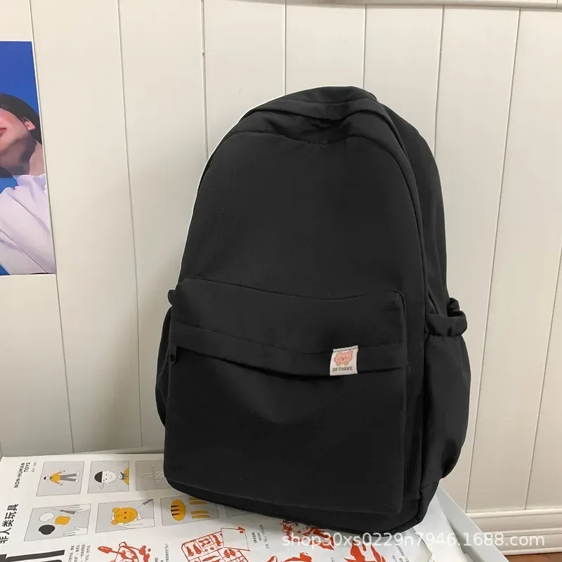 nouveau sac à dos imperméable en nylon pour femmes sac de voyage pour femmes sacs à dos cartable pour adolescentes couleur unie bookbag mochila bookbag