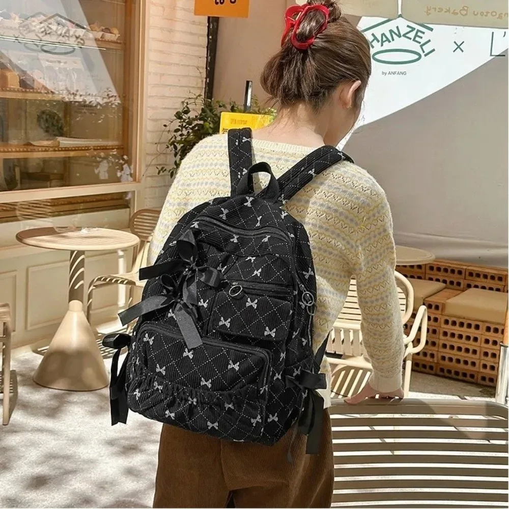 Sac à dos scolaire en velours côtelé à nœud, style Ins, imprimé nœud, polyvalent, grande capacité, pour étudiants et femmes
