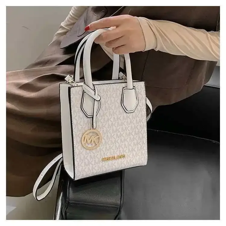 sac à main et sac bandoulière michael kors mercer mini en cuir pvc pour femme, nouveau modèle 2026, un sac raffiné et multifonctionnel.