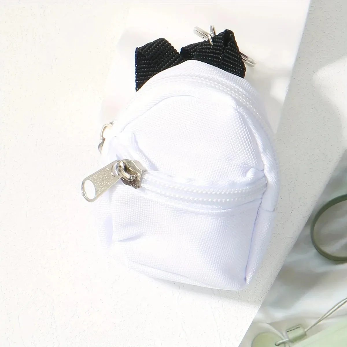 mini sac à dos porte-monnaie porte-clés avec deux poches zippées, pochette de rangement fonctionnelle pour petits essentiels, joli accessoire de sac pour le quotidien