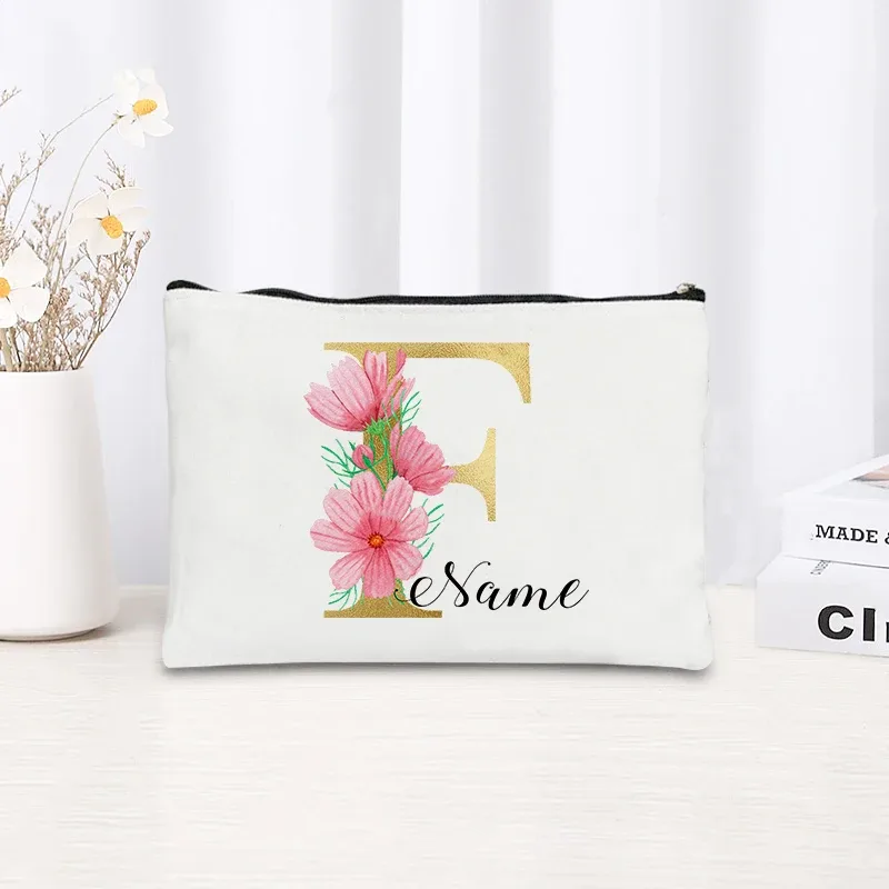 grande pochette zippée à motif floral rose et initiales dorées, organisateur d'essentiels de voyage en toile, trousse de maquillage pour enterrement de vie de jeune fille avec sac personnalisé avec nom.