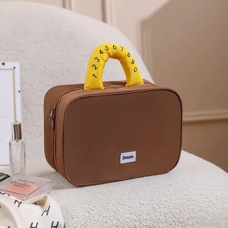 trousse de maquillage pliable de haute valeur esthétique avec crochet, sac de rangement de voyage de grande capacité, trousse de toilette portable pour voyage