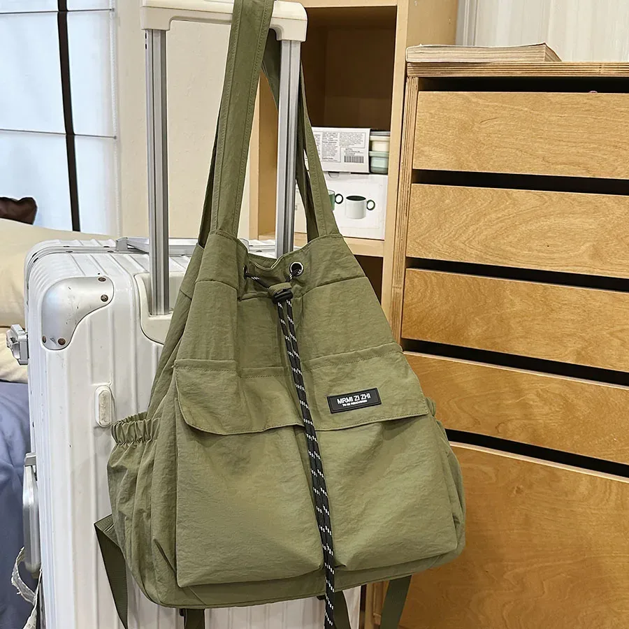 sac à dos de voyage 2-en-1 pour femmes, léger, de style coréen, décontracté, sac à bandoulière multifonctionnel avec cordon de serrage pour étudiantes.