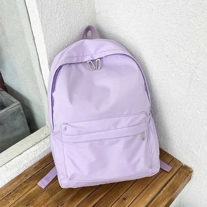 haute qualité nouveau imperméable à l'eau en nylon femmes sac à dos femme sac de voyage sacs à dos cartable pour adolescentes couleur unie bookbag