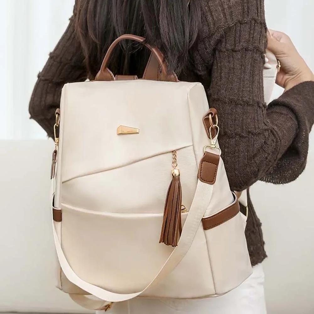sac à dos en nylon de grande capacité pour femmes, multi-poches, doux au toucher, imperméable, avec pompon décoratif, multi-usages, antivol, sac à dos de jour