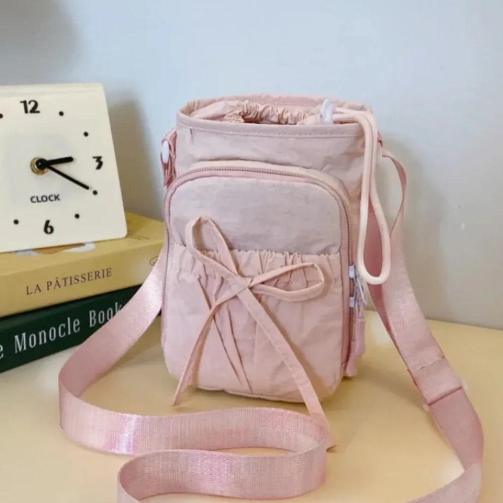 Nouveau sac bandoulière léger pour téléphone portable pour femme, sac de sport et cyclisme d'extérieur, porte-bouteille d'eau, sac de voyage, sacs à main au design noué