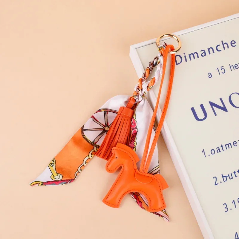 1 pièce porte-clés poney en cuir avec cordon tressé, pendentif pour sac à dos, accessoires de suspension pour sac de téléphone, décoration diy