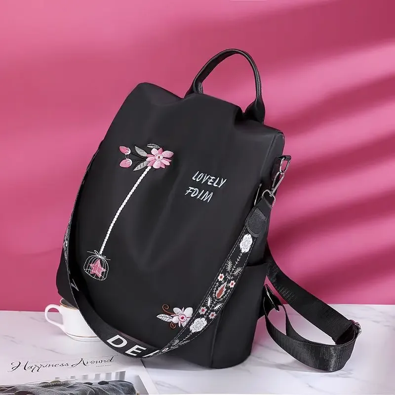 sac à dos oxford imperméable pour femmes, sac d'école antivol à la mode, sac à main de voyage de grande capacité avec broderie de styliste