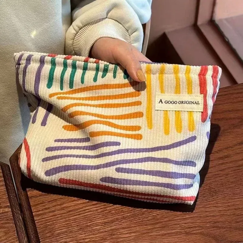 Trousse de toilette en velours côtelé, sac de rangement portable rayé pour produits de soin, essentiels de voyage pour étudiants et déplacements professionnels