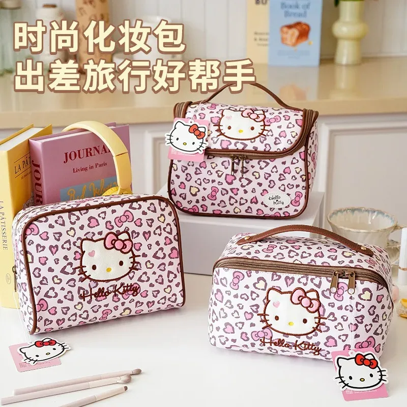 Véritable trousse de maquillage Hello Kitty, trousse de maquillage Kawaii à imprimé léopard, sac de rangement de grande capacité, sac de voyage portable.