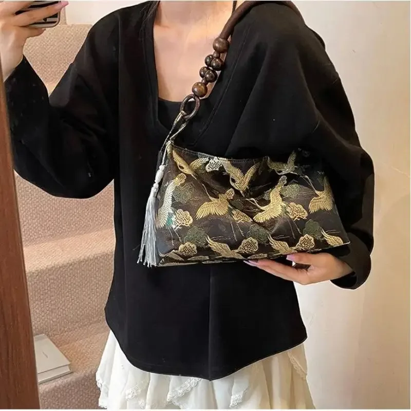 hasp fil à coudre brodé style national sacs à bandoulière gland décoration 2025 printemps nouvelle offre spéciale sacs à main pour femmes