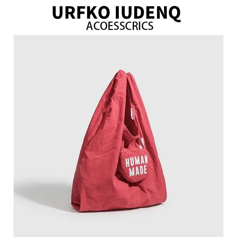 sac de rangement human made 2026 pour hommes et femmes, sac fourre-tout pliable imprimé love, sac de courses portable et imperméable pour usage quotidien