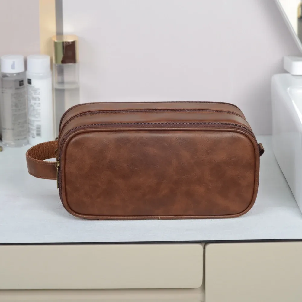 trousse de toilette de voyage pour hommes en cuir résistante à l'eau avec poignée, organisateur polyvalent pour articles de toilette, trousse de toilette personnalisable avec logo, kit dopp