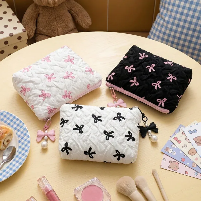 Porte-monnaie mignon avec nœud, mini sac de rangement cosmétique, pochette portable à fermeture éclair pour femme, cadeau de voyage