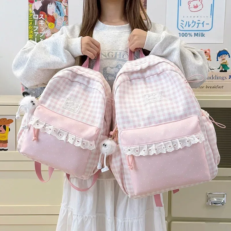 Sac à dos décontracté à carreaux de grande capacité pour l'école, les voyages, les activités de plein air et l'usage quotidien, adapté aux élèves du collège et du lycée et aux étudiants.