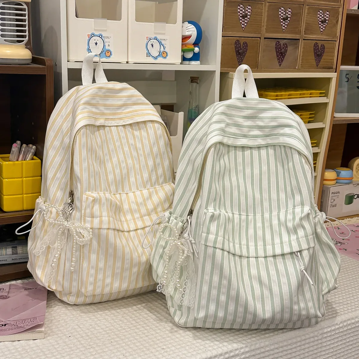 Nouveau style japonais, sac à dos décontracté à rayures, grande capacité, pour collégiennes, idéal pour les voyages, sac à dos à double bandoulière pour filles 2026