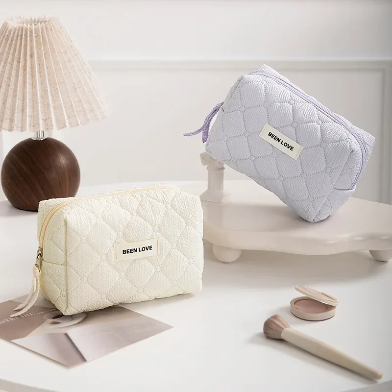 Nouveau sac de rangement octogonal pour maquillage, pochette de voyage, sac de rangement de couleur unie, grande capacité, sac cosmétique haut de gamme.