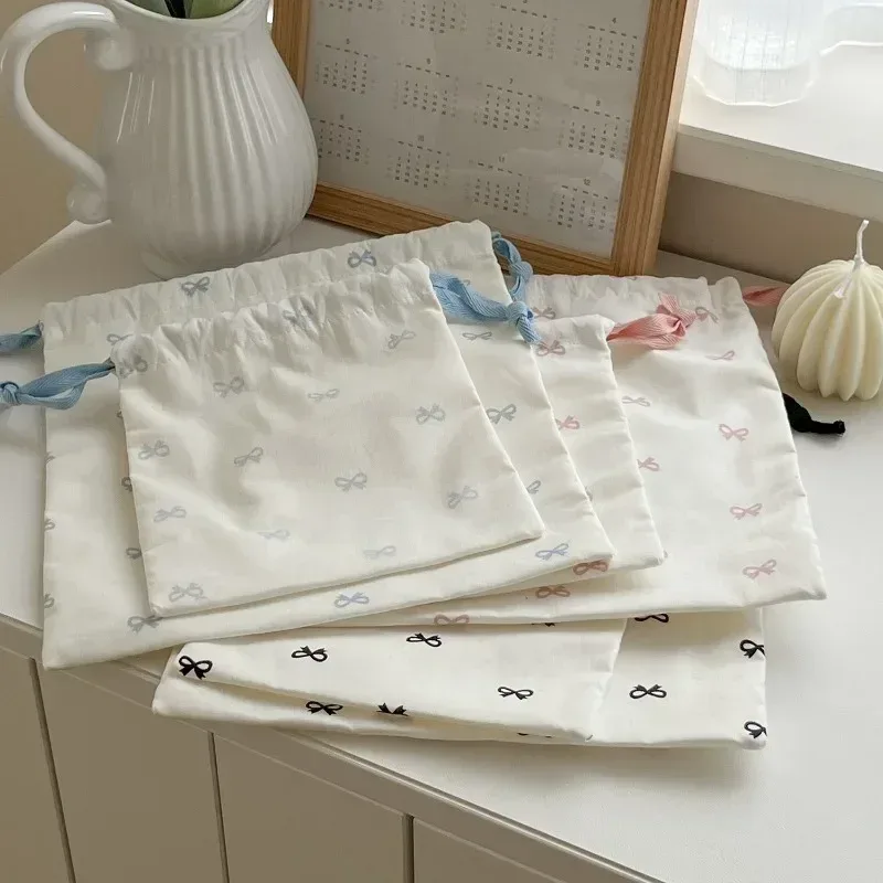 sac de rangement coréen à cordon imprimé avec nœud mignon, sac à cosmétiques portable pour filles, organisateur de maquillage de voyage pour femmes, pochette à main