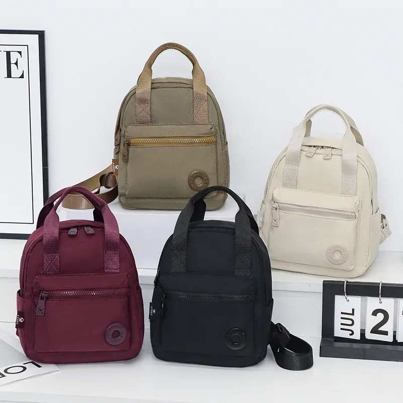 Sac à main en nylon décontracté pour voyage, sac bandoulière léger multi-couches, sac à dos unisexe respirant avec sangle d'épaule, couleur unie