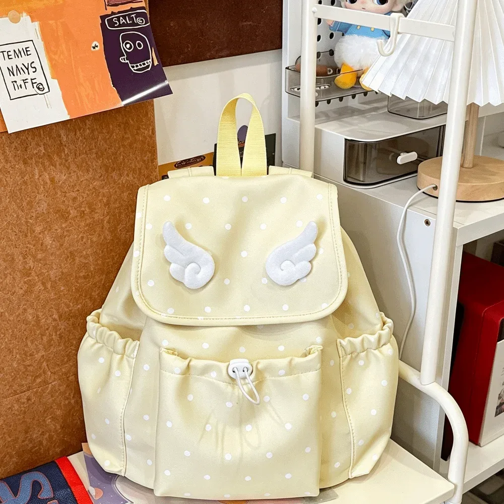 sac à dos à cordon de serrage imprimé à pois, fermeture à cordon, design à rabat, sac à dos pour livres, décor ailes d'ange, style décontracté