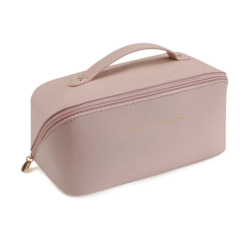 trousse de maquillage pratique et à la mode en pu, sac de rangement de voyage, trousse de toilette de grande capacité, trousse de maquillage pour oreiller de beauté stimulant les mains