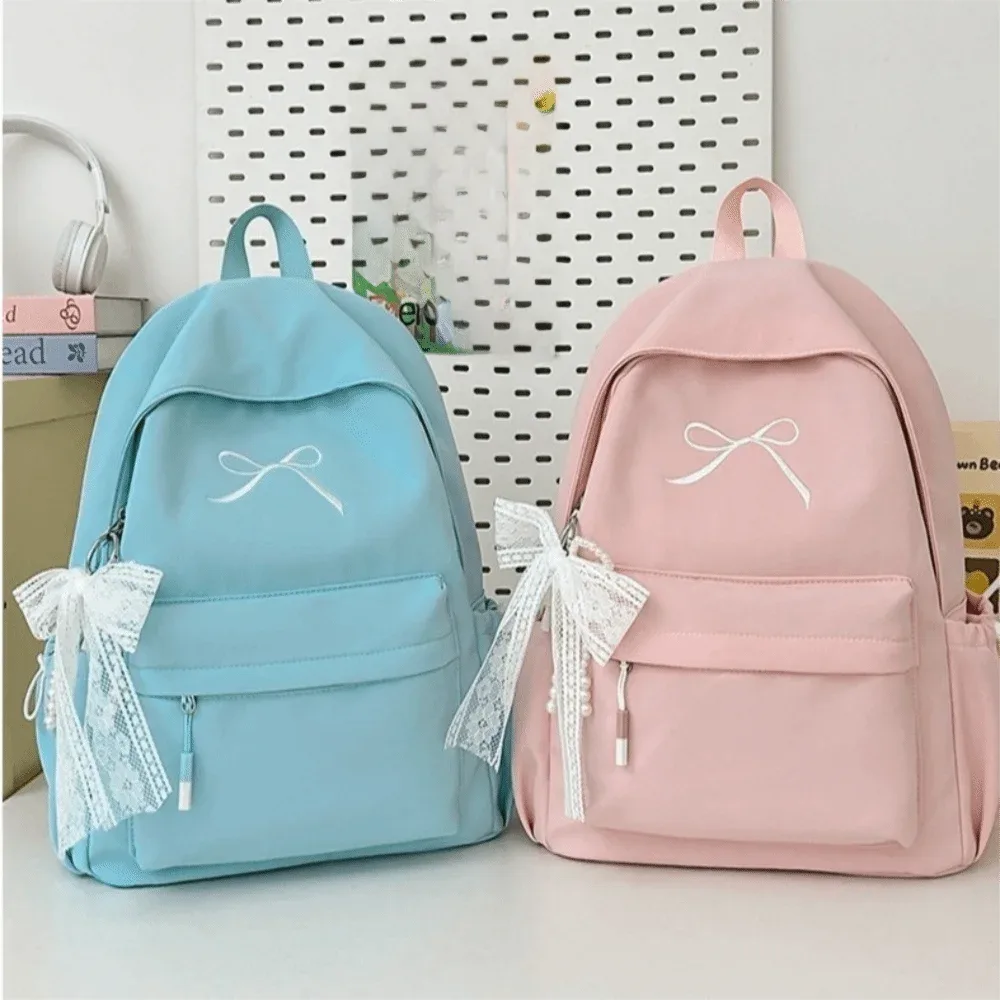 sac à dos portable avec nœud brodé pour filles, cartable en nylon de couleur unie pour étudiants, sac à dos de voyage léger de grande capacité