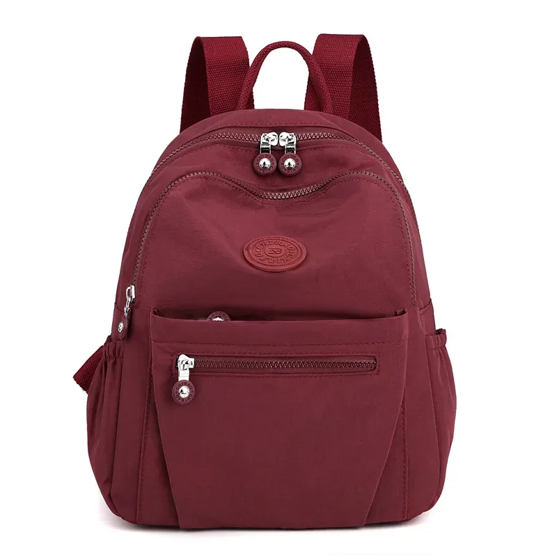 sac à dos léger en nylon pour femme, sac fourre-tout en nylon multi-poches, sac à dos décontracté imperméable pour les voyages, les trajets domicile-travail et l'usage quotidien