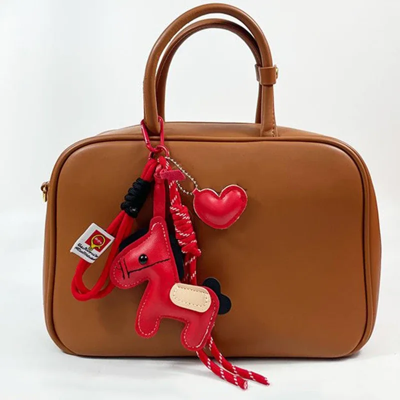 Porte-clés en corde tressée avec pendentif en cuir motif cheval, accessoire de mode pour sacs à main, sacs à dos et décoration de clés de voiture