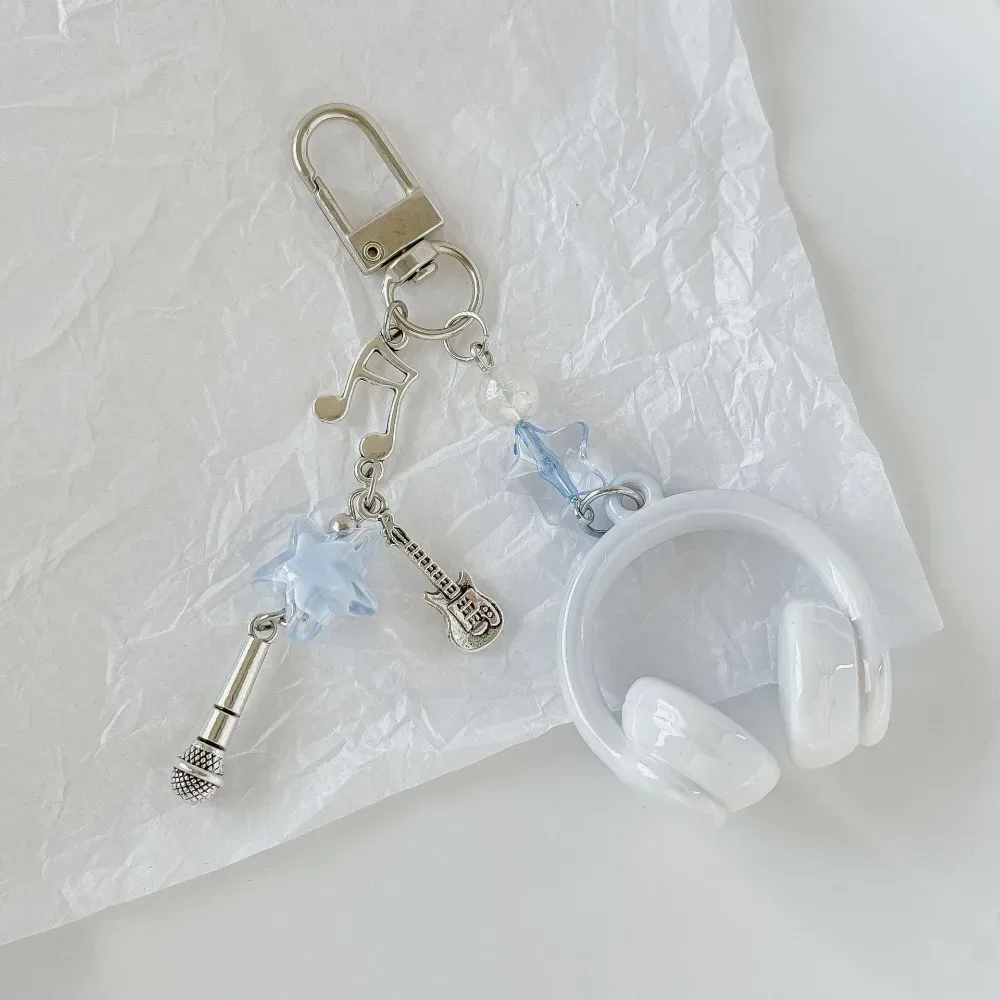 écouteurs de musique noirs, chaînes pour téléphone portable, petit pendentif musical à bouton-poussoir, pendentif créatif de décompression pour sac à dos, porte-clés